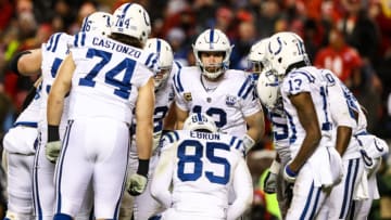 KANSAS CITY, MO - JANUARY 12: Andrew Luck #12 of the Indianapolis Colts calls a play in the huddle during the fourth quarter of the AFC Divisional Round playoff game against the Kansas City Chiefs at Arrowhead Stadium on January 12, 2019 in Kansas City, Missouri. (Photo by Jamie Squire/Getty Images)