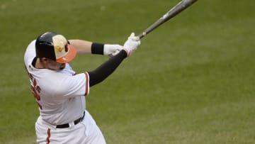Jun 5, 2016; Baltimore, MD, USA; Baltimore Orioles catcher Matt Wieters (32) hits a two run single during the eighth inning against the New York Yankees at Oriole Park at Camden Yards. The Orioles won 3-1. Mandatory Credit: Tommy Gilligan-USA TODAY Sports