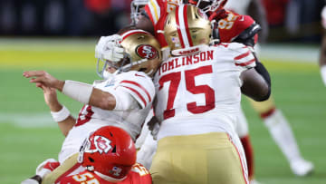 MIAMI, FLORIDA - FEBRUARY 02: Jimmy Garoppolo #10 of the San Francisco 49ers is sacked by Frank Clark #55 of the Kansas City Chiefs during the fourth quarter in Super Bowl LIV at Hard Rock Stadium on February 02, 2020 in Miami, Florida. (Photo by Al Bello/Getty Images)