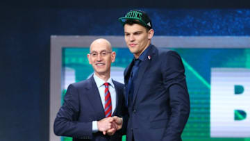 Jun 23, 2016; New York, NY, USA; Ante Zizic greets NBA commissioner Adam Silver after being selected as the number twenty-three overall pick to the Boston Celtics in the first round of the 2016 NBA Draft at Barclays Center. Mandatory Credit: Jerry Lai-USA TODAY Sports