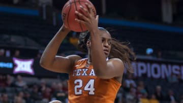 OKLAHOMA CITY, OK - MARCH 05: Texas (24) Joyner Holmes getting a rebound while Baylor (2) Didi Richard plays defense during the Big 12 Women's Championship on March 05, 2018 at Chesapeake Energy Arena in Oklahoma City, OK. (Photo by Torrey Purvey/Icon Sportswire via Getty Images)