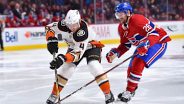 MONTREAL, QC - FEBRUARY 03: Anaheim Ducks Defenceman Cam Fowler (4) gains control of the puck over Montreal Canadiens Defenceman Jeff Petry (26) during the Anaheim Ducks versus the Montreal Canadiens game on February 3, 2018, at Bell Centre in Montreal, QC (Photo by David Kirouac/Icon Sportswire via Getty Images)