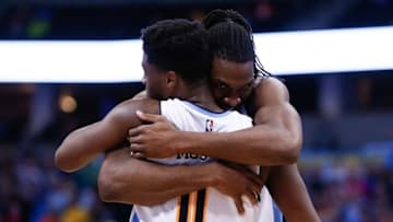 Mar 6, 2016; Denver, CO, USA; Denver Nuggets forward Kenneth Faried (35) celebrates with guard Emmanuel Mudiay (0) after a play in the fourth quarter against the Dallas Mavericks at the Pepsi Center. The Nuggets defeated the Mavericks 116-114 in overtime. Mandatory Credit: Isaiah J. Downing-USA TODAY Sports