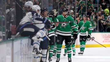 DALLAS, TEXAS - OCTOBER 17: Jani Hakanpaa #2 of the Dallas Stars celebrates after scoring a goal against the Winnipeg Jets in the second period at American Airlines Center on October 17, 2022 in Dallas, Texas. (Photo by Tom Pennington/Getty Images)