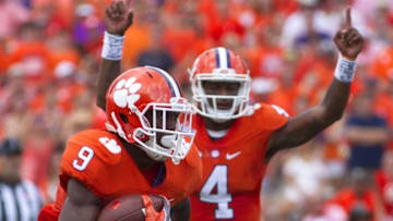 Sep 17, 2016; Clemson, SC, USA; Clemson Tigers running back Wayne Gallman (9) carries the ball for a touchdown during the first quarter against the South Carolina State Bulldogs at Clemson Memorial Stadium. Mandatory Credit: Joshua S. Kelly-USA TODAY Sports