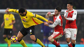 LONDON, ENGLAND - JANUARY 31: Troy Deeney of Watford and Shkodran Mustafi of Arsenal compete for the ball during the Premier League match between Arsenal and Watford at Emirates Stadium on January 31, 2017 in London, England. (Photo by Shaun Botterill/Getty Images)