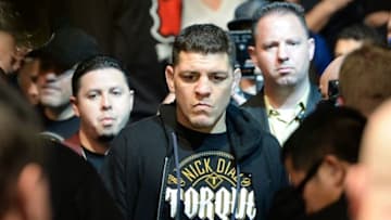 Jan 31, 2015; Las Vegas, NV, USA; Nick Diaz (blue gloves) walks to the ring before a middleweight fight against Anderson Silva (not pictured) during UFC 183 at the MGM Grand Garden Arena. Mandatory Credit: Jayne Kamin-Oncea-USA TODAY Sports