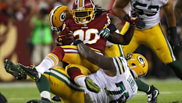 LANDOVER, MD - AUGUST 19: Rob Kelley #20 of the Washington Redskins is tackled by Green Bay Packers defenders in the first half during a preseason game at FedExField on August 19, 2017 in Landover, Maryland. (Photo by Patrick Smith/Getty Images)