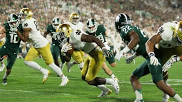 Notre Dame's Dexter Williams rushes against Michigan State football defense (Photo by Leon Halip/Getty Images)