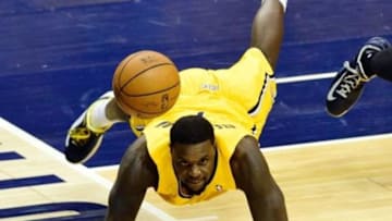 May 3, 2014; Indianapolis, IN, USA; Indiana Pacers guard Lance Stephenson (1) dives for a ball during the first quarter of game seven against the Atlanta Hawks of the first round of the 2014 NBA Playoffs at Bankers Life Fieldhouse. Mandatory Credit: Marc Lebryk-USA TODAY Sports
