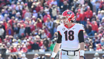 ATLANTA, GA - NOVEMBER 27: JT Daniels #18 of the Georgia Bulldogs on the field against the Georgia Tech Yellow Jackets at Bobby Dodd Stadium on November 27, 2021 in Atlanta, Georgia. (Photo by Adam Hagy/Getty Images)