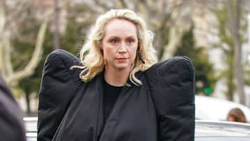 PARIS, FRANCE - FEBRUARY 27: Gwendoline Christie, English actress known for portraying "Brienne of Tarth" in the series Games of Thrones, as well as "Captain Phasma" in Star Wars, wears a black outfit with large shoulder pads, outside Leonard, during Paris Fashion Week - Womenswear Fall/Winter 2020/2021, on February 27, 2020 in Paris, France. (Photo by Edward Berthelot/Getty Images)
