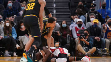 Miami Heat forward Jimmy Butler (22) lays on the ground after suffering an injury( Cary Edmondson-USA TODAY Sports)