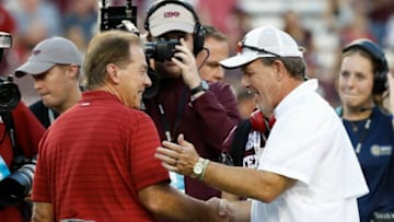 COLLEGE STATION, TEXAS - OCTOBER 09: Head coach Nick Saban of the Alabama Crimson Tide and head coach Jimbo Fisher of the Texas A&M Aggies meet before the game at Kyle Field on October 09, 2021 in College Station, Texas. (Photo by Bob Levey/Getty Images)