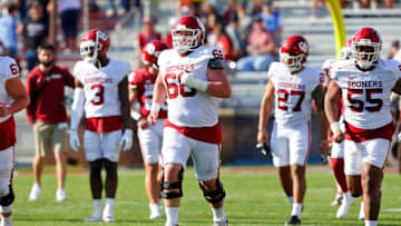 NORMAN, OK - APRIL 24: Offensive lineman Ian McIver #61, offensive lineman Robert Congel #66, and offensive lineman Aaryn Parks #55 of the Oklahoma Sooners run paces after the team's spring game at Gaylord Family Oklahoma Memorial Stadium on April 24, 2021 in Norman, Oklahoma. (Photo by Brian Bahr/Getty Images)