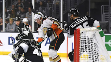 LOS ANGELES, CALIFORNIA - SEPTEMBER 23: Ondrej Kase #25 of the Anaheim Ducks takes a shot in front of Cal Petersen #40 and Kurtis MacDermid #56 of the Los Angeles Kings during a preseason game at at Staples Center on September 23, 2019 in Los Angeles, California. (Photo by Harry How/Getty Images)