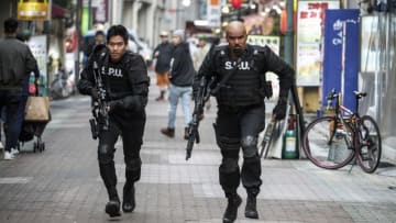 "Ekitai Rashku" -- Hondo, Deacon, Tan and Commander Hicks engage in a manhunt across Tokyo when they escort an extradited fugitive to Japan, where he escapes local custody. Back in Los Angeles, the rest of SWAT search for any contacts the criminal cultivated while hiding out in Los Angeles, and Street isolates himself from the team as he deals with family issues, on S.W.A.T., Wednesday, Jan. 29 (10:00-11:00 PM, ET/PT) on the CBS Television Network. Portions of the episode were filmed on location in Tokyo. Pictured (L-R): David Lim as Victor Tan and Shemar Moore as Daniel "Hondo" Harrelson. Photo: Yosuke Koino/CBS ©2019 CBS Broadcasting, Inc. All Rights Reserved.
