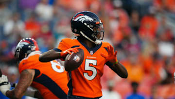 Aug 28, 2021; Denver, Colorado, USA; Denver Broncos quarterback Teddy Bridgewater (5) prepares to pass in the first quarter during a preseason game against the Los Angeles Rams at Empower Field at Mile High. Mandatory Credit: Ron Chenoy-USA TODAY Sports