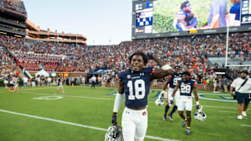 What does Dematrius Davis' transfer portal departure mean for the Auburn football QB battle? (Photo by Michael Chang/Getty Images)