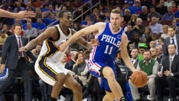 Oct 30, 2015; Philadelphia, PA, USA; Philadelphia 76ers guard Nik Stauskas (11) dribbles past Utah Jazz guard Alec Burks (10) during the second quarter at Wells Fargo Center. Mandatory Credit: Bill Streicher-USA TODAY Sports