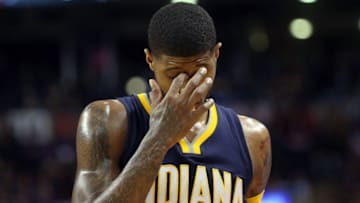 Apr 18, 2016; Toronto, Ontario, CAN; Indiana Pacers forward Paul George (13) reacts as he exits the game late in the fourth quarter against the Toronto Raptors in game two of the first round of the 2016 NBA Playoffs at Air Canada Centre. The Raptors beat the Pacers 98-87. Mandatory Credit: Tom Szczerbowski-USA TODAY Sports