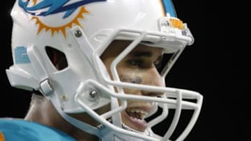 Aug 16, 2014; Tampa, FL, USA; Miami Dolphins quarterback Brady Quinn (7) against the Tampa Bay Buccaneers during the second half at Raymond James Stadium. Miami Dolphins defeated the Tampa Bay Buccaneers 20-14. Mandatory Credit: Kim Klement-USA TODAY Sports