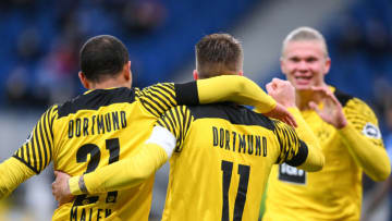 Marco Reus celebrates his goal with Donyell Malen and Erling Haaland. (Photo by Markus Gilliar/GES-Sportfoto/Getty Images)