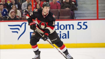 Jan 30, 2014; Ottawa, Ontario, CAN; Ottawa Senators center Zack Smith (15) skates with the puck in the first period against the Tampa Bay Lightning at the Canadian Tire Centre. Mandatory Credit: Marc DesRosiers-USA TODAY Sports