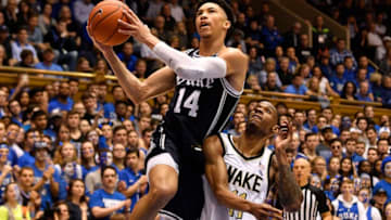 DURHAM, NORTH CAROLINA - JANUARY 11: Jordan Goldwire #14 of the Duke Blue Devils drives against Torry Johnson #11 of the Wake Forest Demon Deacons during the second half of their game at Cameron Indoor Stadium on January 11, 2020 in Durham, North Carolina. (Photo by Grant Halverson/Getty Images)