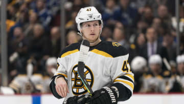 VANCOUVER, BC - FEBRUARY 22: Torey Krug #47 of the Boston Bruins during NHL action against the Vancouver Canucks at Rogers Arena on February 22, 2020 in Vancouver, Canada. (Photo by Rich Lam/Getty Images)