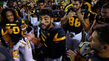 Sep 10, 2016; Tempe, AZ, USA; Arizona State Sun Devils quarterback Manny Wilkins (5) talks to teammates in the huddle against the Texas Tech Red Raiders at Sun Devil Stadium. Mandatory Credit: Mark J. Rebilas-USA TODAY Sports