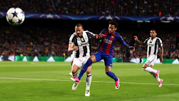 BARCELONA, SPAIN - APRIL 19: Neymar of FC Barcelona competes with Leonardo Bonucci of Juventus during the UEFA Champions League Quarter Final second leg match between FC Barcelona and Juventus at Camp Nou on April 19, 2017 in Barcelona, Spain. (Photo by Chris Brunskill Ltd/Getty Images)
