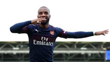 LONDON, ENGLAND - OCTOBER 07: Alexandre Lacazette of Arsenal celebrates after scoring his team's second goal during the Premier League match between Fulham FC and Arsenal FC at Craven Cottage on October 7, 2018 in London, United Kingdom. (Photo by Catherine Ivill/Getty Images)