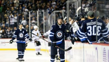 WINNIPEG, MB - NOVEMBER 29: Winnipeg Jets forward Patrik Laine (29) is congratulated by his team mates on his goal against the Chicago Blackhawks during the regular season game between the Winnipeg Jets and the Chicago Blackhawks on November 29, 2018, at the Bell MTS Place in Winnipeg MB. (Photo by Terrence Lee/Icon Sportswire via Getty Images)