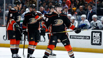 ANAHEIM, CA - NOVEMBER 01: From left, Korbinian Holzer #5, Sam Steel #34, Josh Mahura #76, and Max Jones #49 of the Anaheim Ducks during the game at Honda Center on November 1, 2019 in Anaheim, California. (Photo by Debora Robinson/NHLI via Getty Images)
