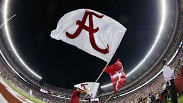 Oct 1, 2016; Tuscaloosa, AL, USA; Alabama Crimson Tide cheerleaders fly the flags after their team scored against the Kentucky Wildcats at Bryant-Denny Stadium. The Crimson Tide defeated Kentucky 34-6. Mandatory Credit: Marvin Gentry-USA TODAY Sports