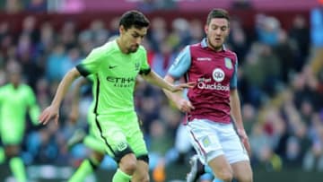 BIRMINGHAM, ENGLAND - JANUARY 30: Jesus Navas of Manchester City and Jordan Veretout of Aston Villa during the Emirates FA Cup match between Aston Villa and Manchester City at Villa Park on January 30, 2016 in Birmingham, England. (Photo by James Baylis - AMA/Getty Images)