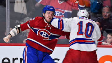 MONTREAL, QC - JANUARY 14: Andrew Shaw #65 of the Montreal Canadiens and J.T. Miller #10 of the New York Rangers fight during the NHL game at the Bell Centre on January 14, 2017 in Montreal, Quebec, Canada. (Photo by Minas Panagiotakis/Getty Images)