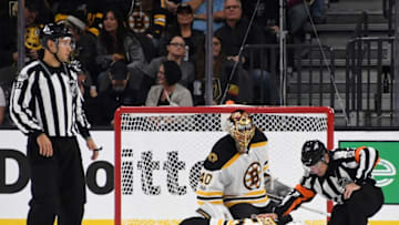 LAS VEGAS, NV - OCTOBER 15: Referees and Tuukka Rask