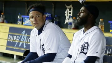 DETROIT, MI - APRIL 16: Miguel Cabrera #24 of the Detroit Tigers watches from the dugout with Josh Harrison #1 of the Detroit Tigers during the eighth inning of a game against the Pittsburgh Pirates at Comerica Park on April 16, 2019 in Detroit, Michigan. The Pirates defeated the Tigers 5-3 in 10 innings. All players are wearing #42 in honor of Jackie Robinson Day. (Photo by Duane Burleson/Getty Images)