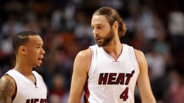 Nov 20, 2014; Miami, FL, USA; Miami Heat forward Josh McRoberts (right) talks with guard Shabazz Napier (left) during the first half against Los Angeles Clippers at American Airlines Arena. Mandatory Credit: Steve Mitchell-USA TODAY Sports