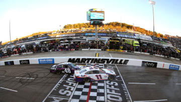 Denny Hamlin, Joe Gibbs Racing, and Alex Bowman, Hendrick Motorsports, NASCAR (Photo by Brian Lawdermilk/Getty Images)