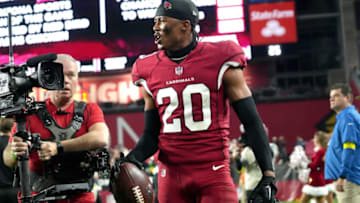 Dec 25, 2022; Glendale, Arizona, USA; Arizona Cardinals cornerback Marco Wilson (20) celebrates his second interception against the Tampa Bay Buccaneers at State Farm Stadium. Mandatory Credit: Joe Rondone-Arizona RepublicNfl Tampa Bay At Cardinals