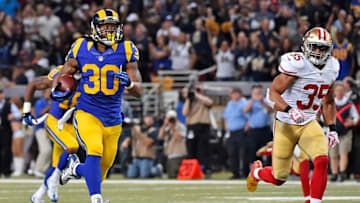 Nov 1, 2015; St. Louis, MO, USA; St. Louis Rams running back Todd Gurley (30) carries the ball to score a seventy one yard touchdown against the San Francisco 49ers during the first half at the Edward Jones Dome. Mandatory Credit: Jasen Vinlove-USA TODAY Sports