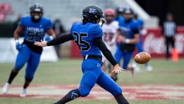 A punter from Montgomery Catholic may choose to be a preferred walk-on for Auburn football over taking a scholarship from Kentucky Mandatory Credit: The Montgomery Advertiser