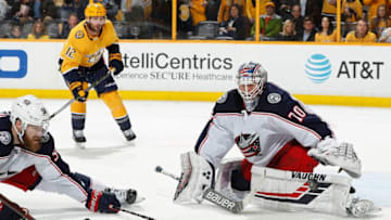 NASHVILLE, TN - APRIL 7: Joonas Korpisalo #70 of the Columbus Blue Jackets makes the save against the Nashville Predators during an NHL game at Bridgestone Arena on April 7, 2018 in Nashville, Tennessee. (Photo by John Russell/NHLI via Getty Images)