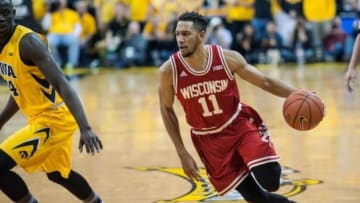 Feb 24, 2016; Iowa City, IA, USA; Wisconsin Badgers guard Jordan Hill (11) goes to the basket against the Iowa Hawkeyes during the first half at Carver-Hawkeye Arena. Mandatory Credit: Jeffrey Becker-USA TODAY Sports