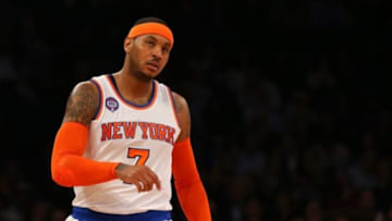 Dec 2, 2014; New York, NY, USA; New York Knicks forward Carmelo Anthony (7) reacts from the court against the Brooklyn Nets during the first quarter at Madison Square Garden. Mandatory Credit: Adam Hunger-USA TODAY Sports