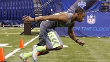 Feb 25, 2014; Indianapolis, IN, USA; Oklahoma State Cowboys defensive back Justin Gilbert runs the shuttle run during the 2014 NFL Combine at Lucas Oil Stadium. Mandatory Credit: Brian Spurlock-USA TODAY Sports