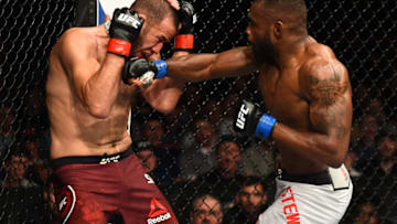 LIVERPOOL, ENGLAND - MAY 27: (R-L) Darren Stewart of England punches Eric Spicely in their middleweight bout during the UFC Fight Night event at ECHO Arena on May 27, 2018 in Liverpool, England. (Photo by Josh Hedges/Zuffa LLC/Zuffa LLC via Getty Images)